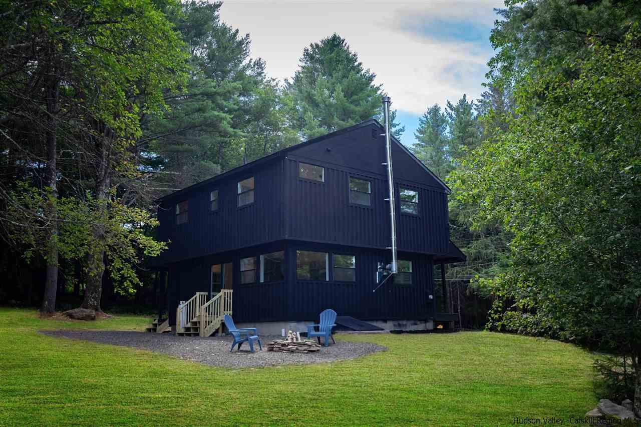 5646 Red Hill Road Claryville, NY 12725 - Photo 32 of 35 a front view of a house with garden