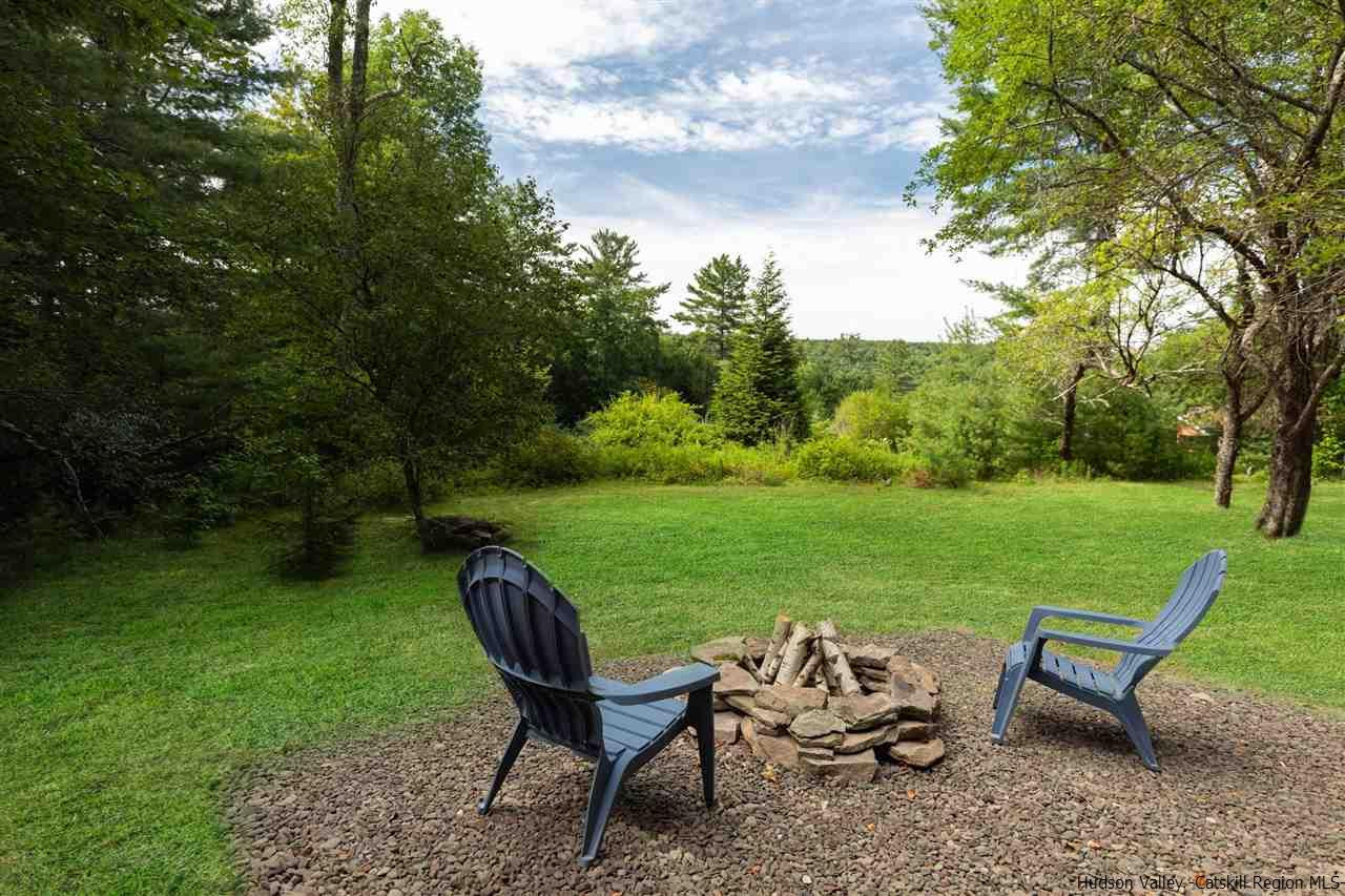 5646 Red Hill Road Claryville, NY 12725 - Photo 33 of 35 a view of a chairs and table in the garden