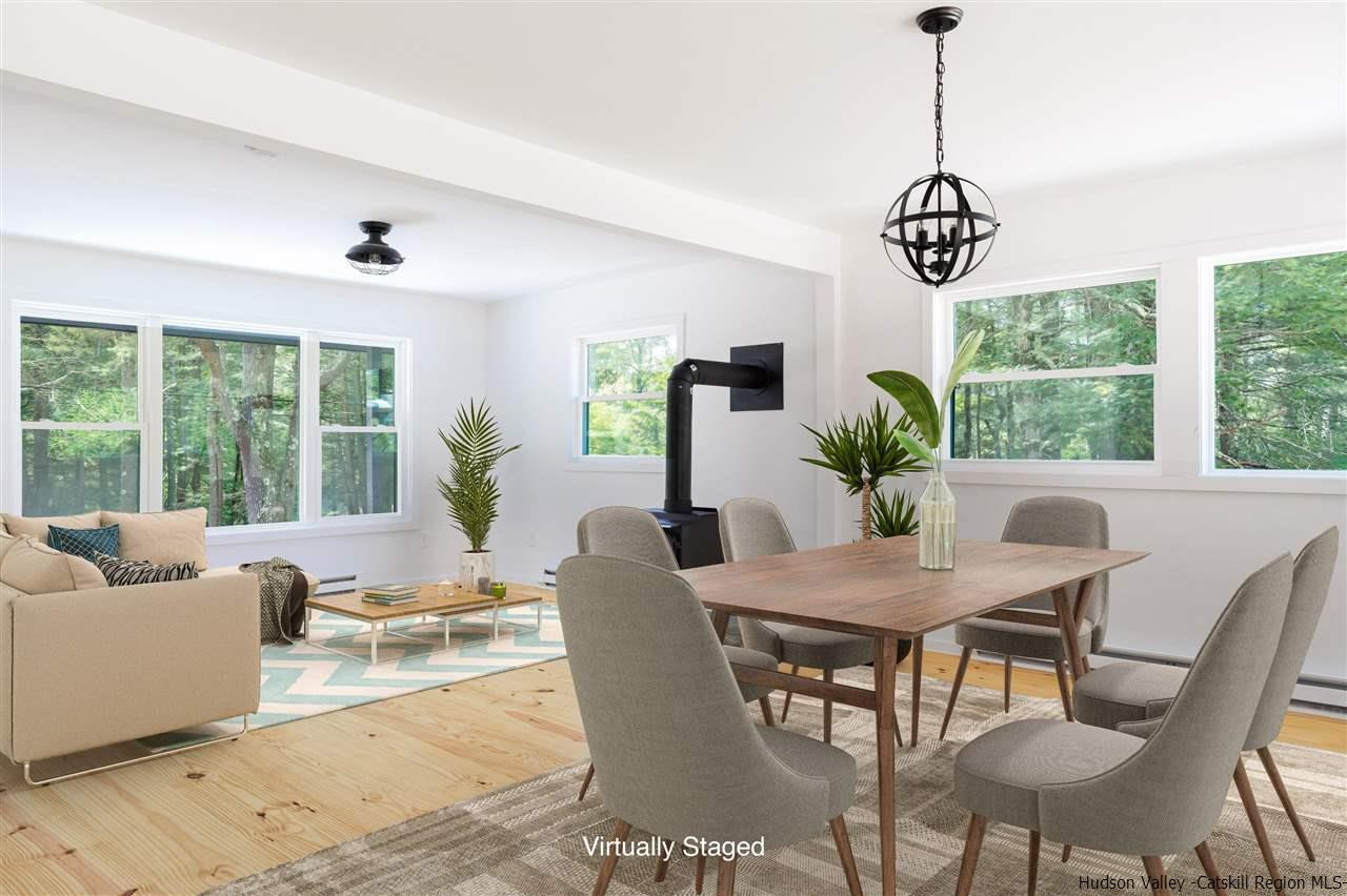 5646 Red Hill Road Claryville, NY 12725 - Photo 9 of 35 a view of a dining room with furniture window and outside view