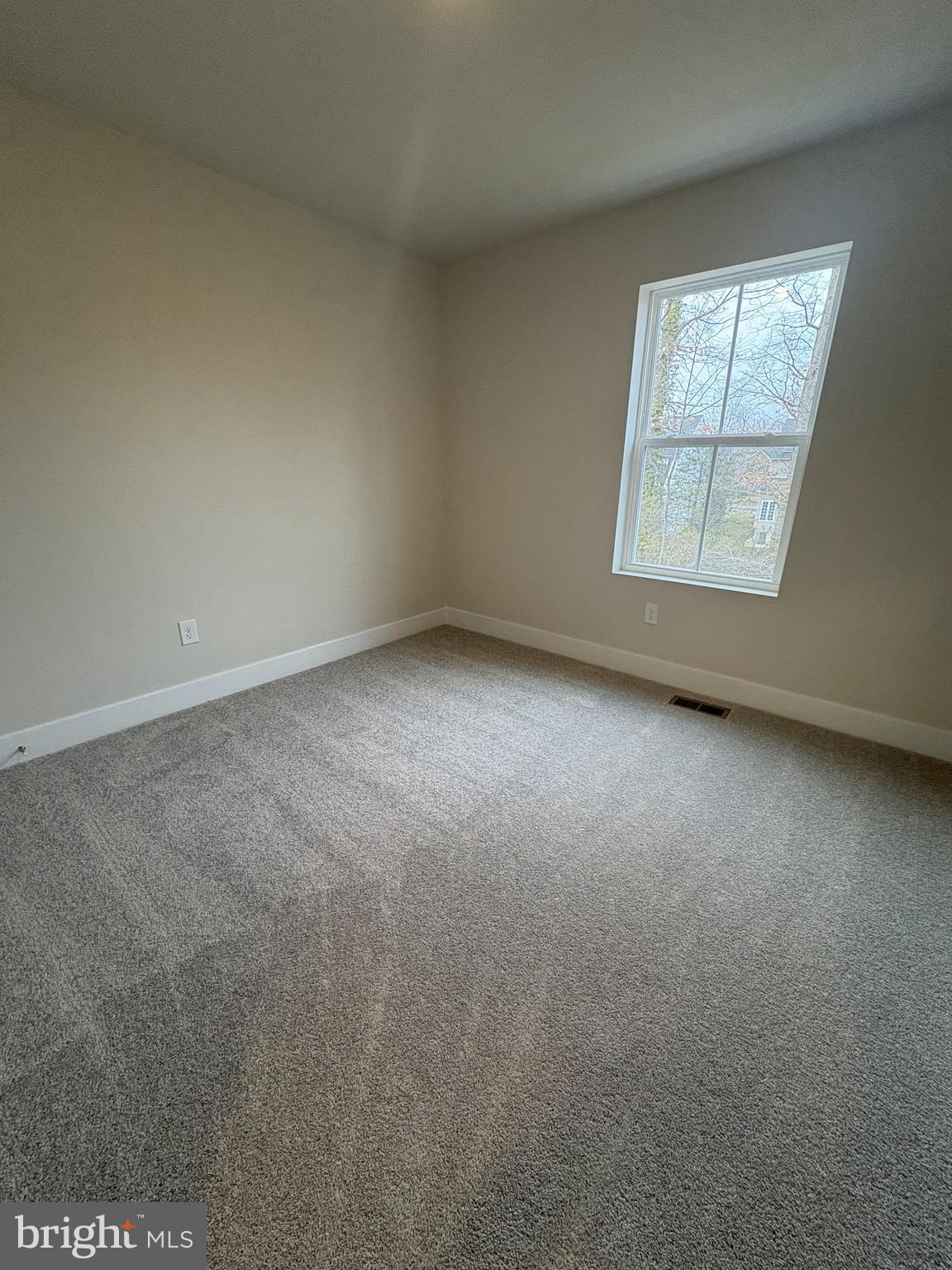 7450 Cornerstone Way Laurel, MD 20707 - Photo 12 of 14 an empty room with a window