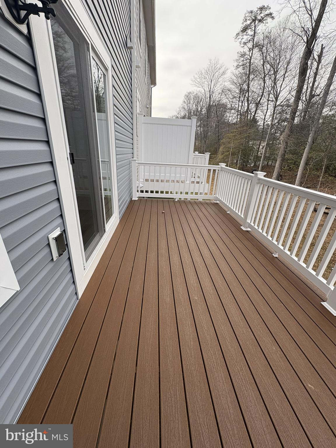 7450 Cornerstone Way Laurel, MD 20707 - Photo 7 of 14 a view of balcony with wooden floor