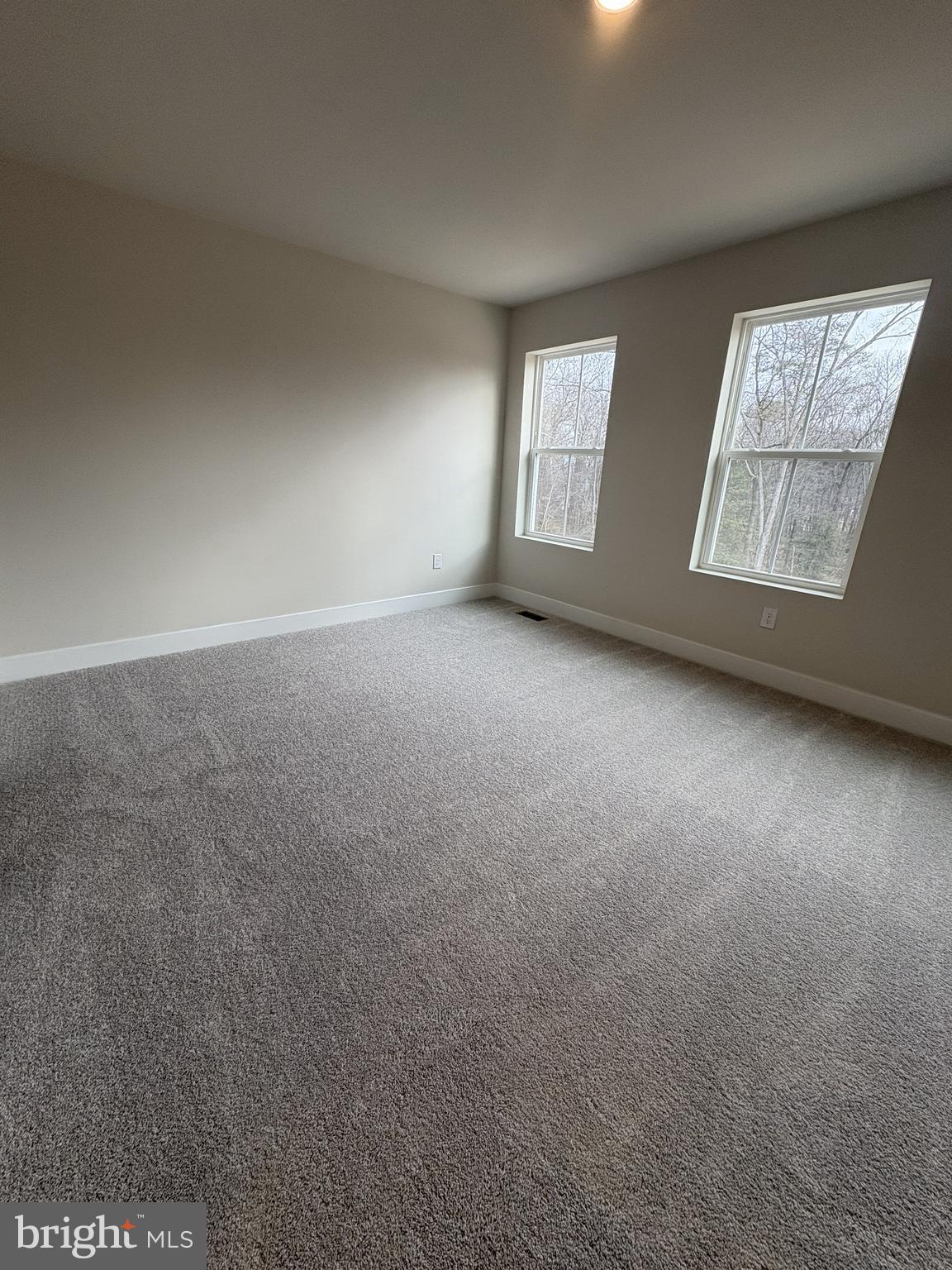 7450 Cornerstone Way Laurel, MD 20707 - Photo 8 of 14 an empty room with windows