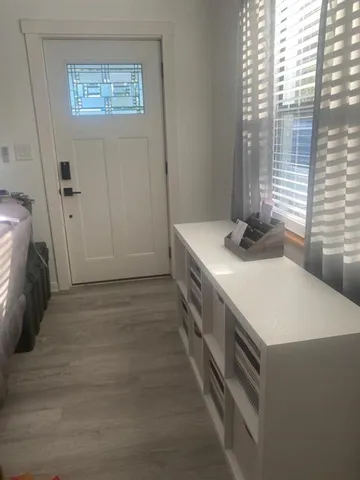 a bathroom with a sink and a washing machine