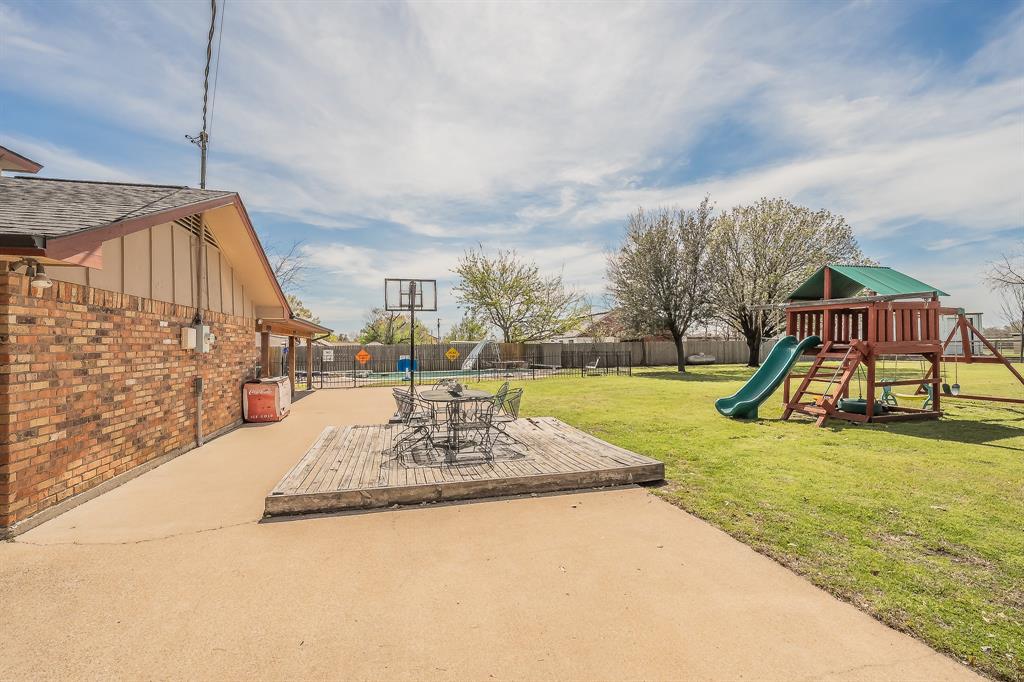 11485 Ridgeview Circle Fort Worth, TX 76244 - Photo 19 of 40 Extended Patio area for entertaining, basketball, chairs, firepit
