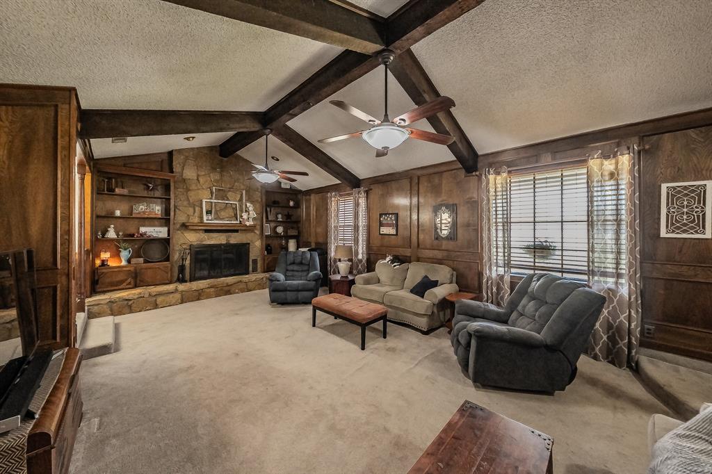 11485 Ridgeview Circle Fort Worth, TX 76244 - Photo 5 of 40 Oversized family room with wood burning fireplace, builtins and expansive brick hearth