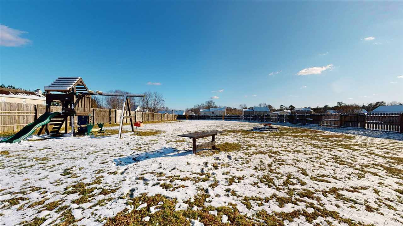 1405 Harvey Johnson Road Raleigh, NC 27603 - Photo 24 of 30 Huge fenced back yard! with outdoor play set Exterior Back