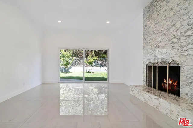 an aerial view of a house with a garden