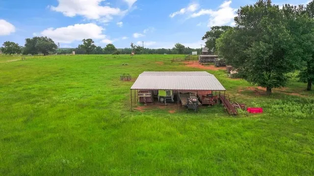 a view of a backyard with a garden