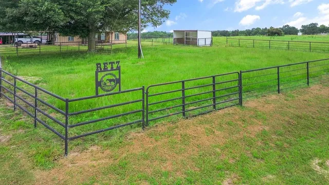 a view of a backyard with a garden
