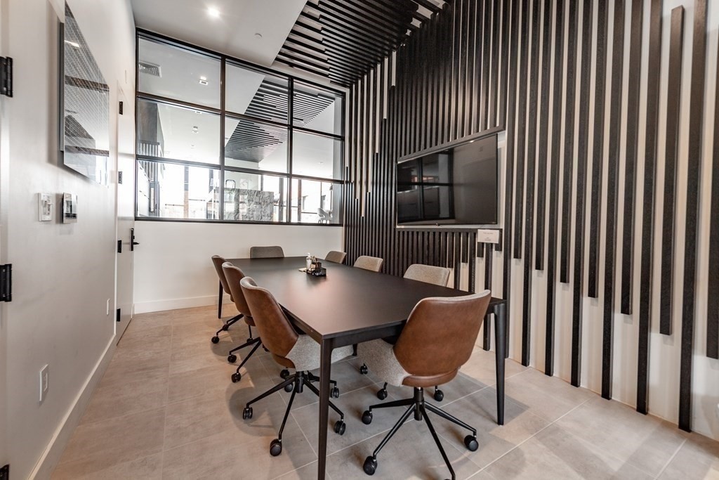 99 Sumner Street, Unit 413 Boston, MA 02128 - Photo 13 of 17 a view of a livingroom with furniture and window