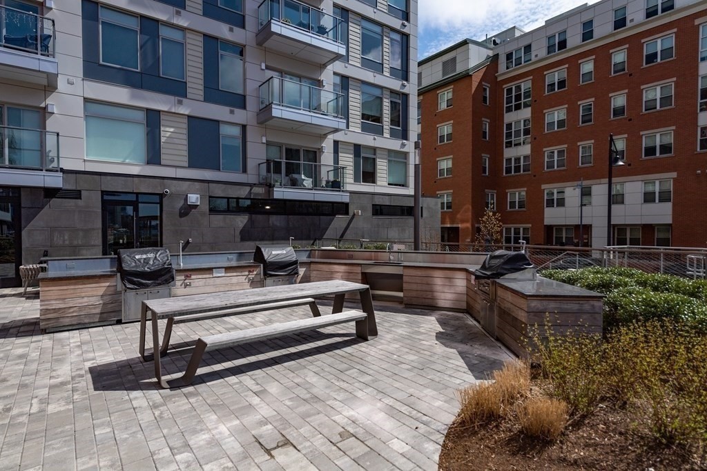 99 Sumner Street, Unit 413 Boston, MA 02128 - Photo 15 of 17 a view of a building with sitting area