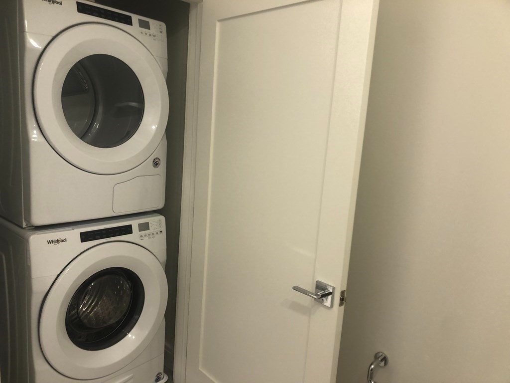 99 Sumner Street, Unit 413 Boston, MA 02128 - Photo 16 of 17 a utility room with dryer and washer