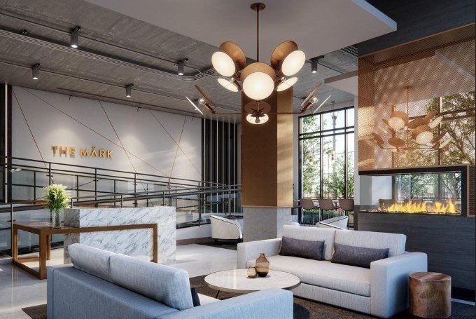 99 Sumner Street, Unit 413 Boston, MA 02128 - Photo 10 of 17 a living room with furniture a chandelier and a fireplace