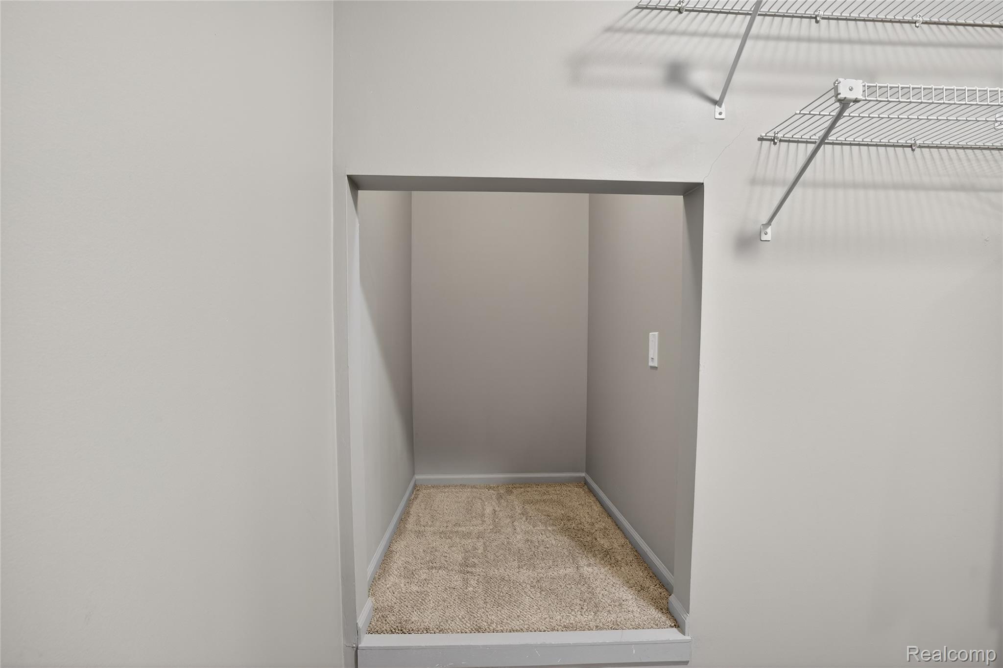 1715 River Road, Unit 77 St. Clair, MI 48079 - Photo 43 of 59 Walk in closet with carpet