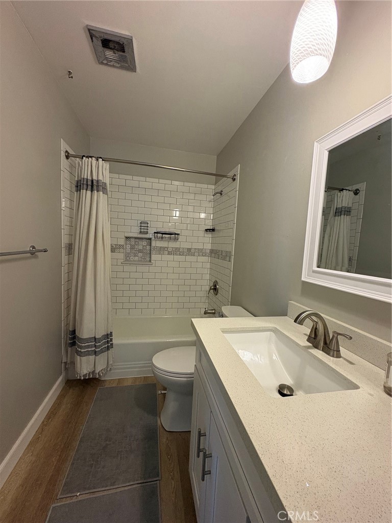 26378 Ridgemoor Road Menifee, CA 92586 - Photo 11 of 20 a bathroom with a sink a toilet and shower
