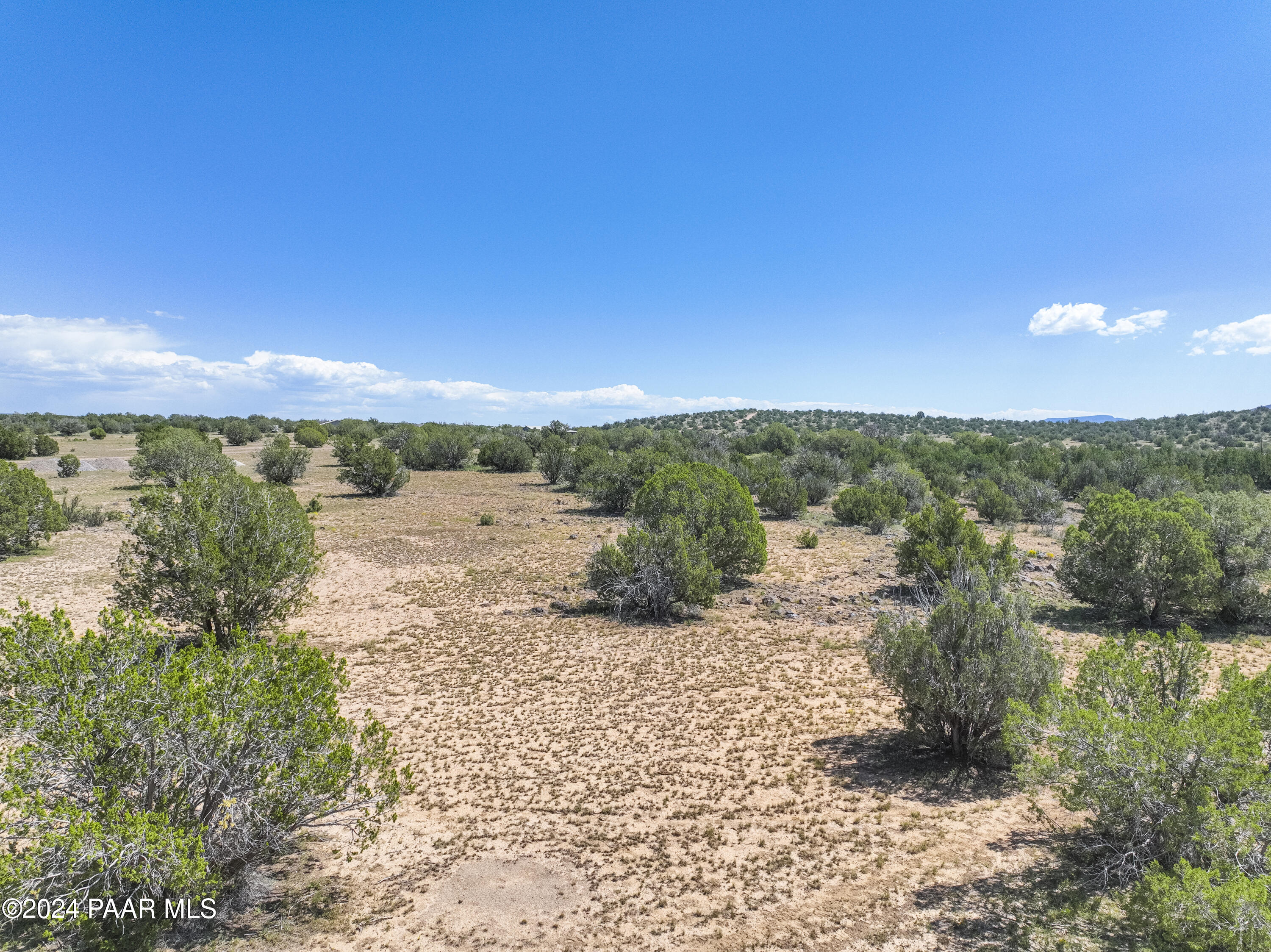 2 Acre Ranch Paulden, AZ 86334 - Photo 13 of 18 a view of a lake with mountains in the background