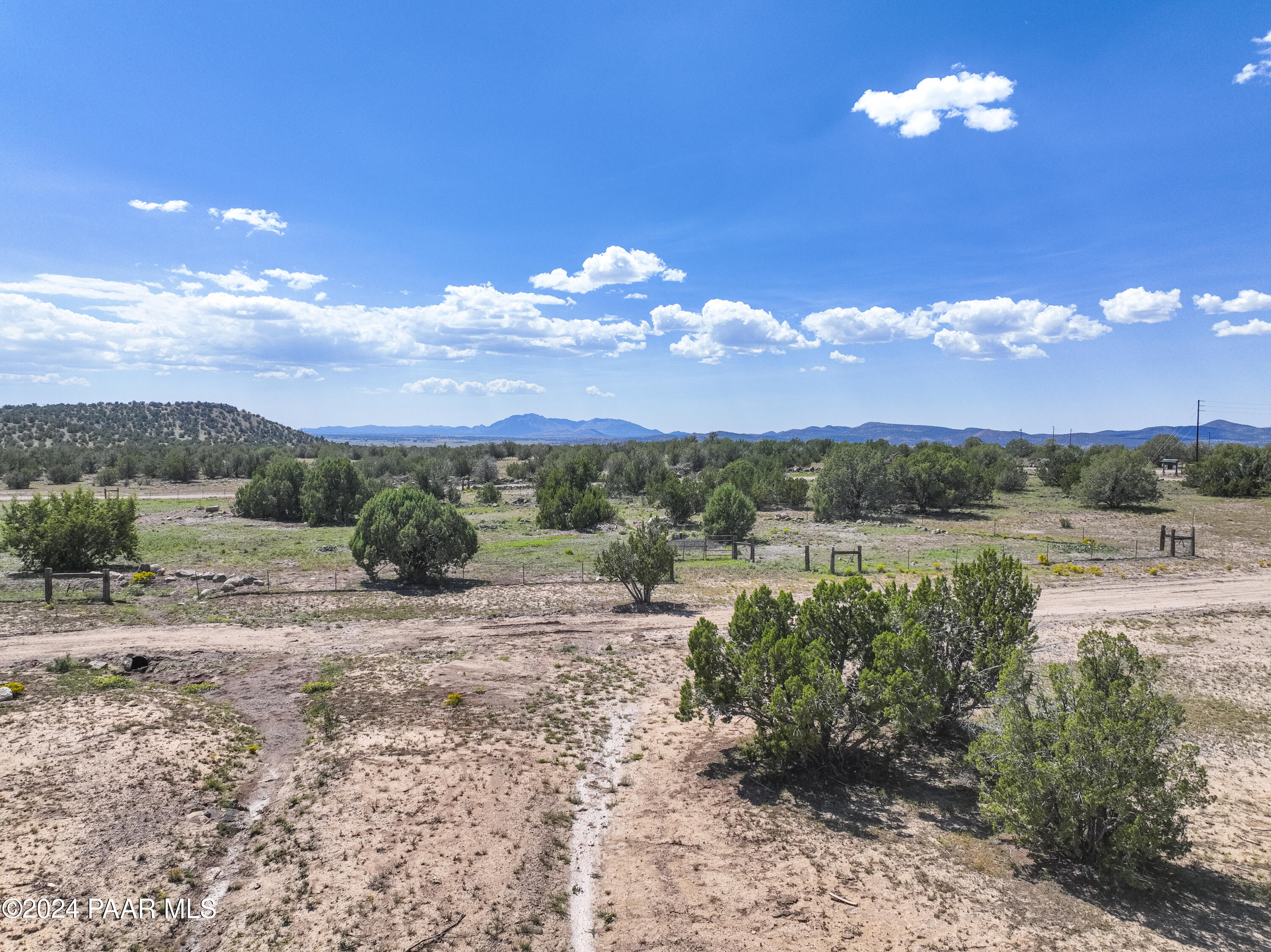 2 Acre Ranch Paulden, AZ 86334 - Photo 3 of 18 a view of a lake with beach and outdoor space