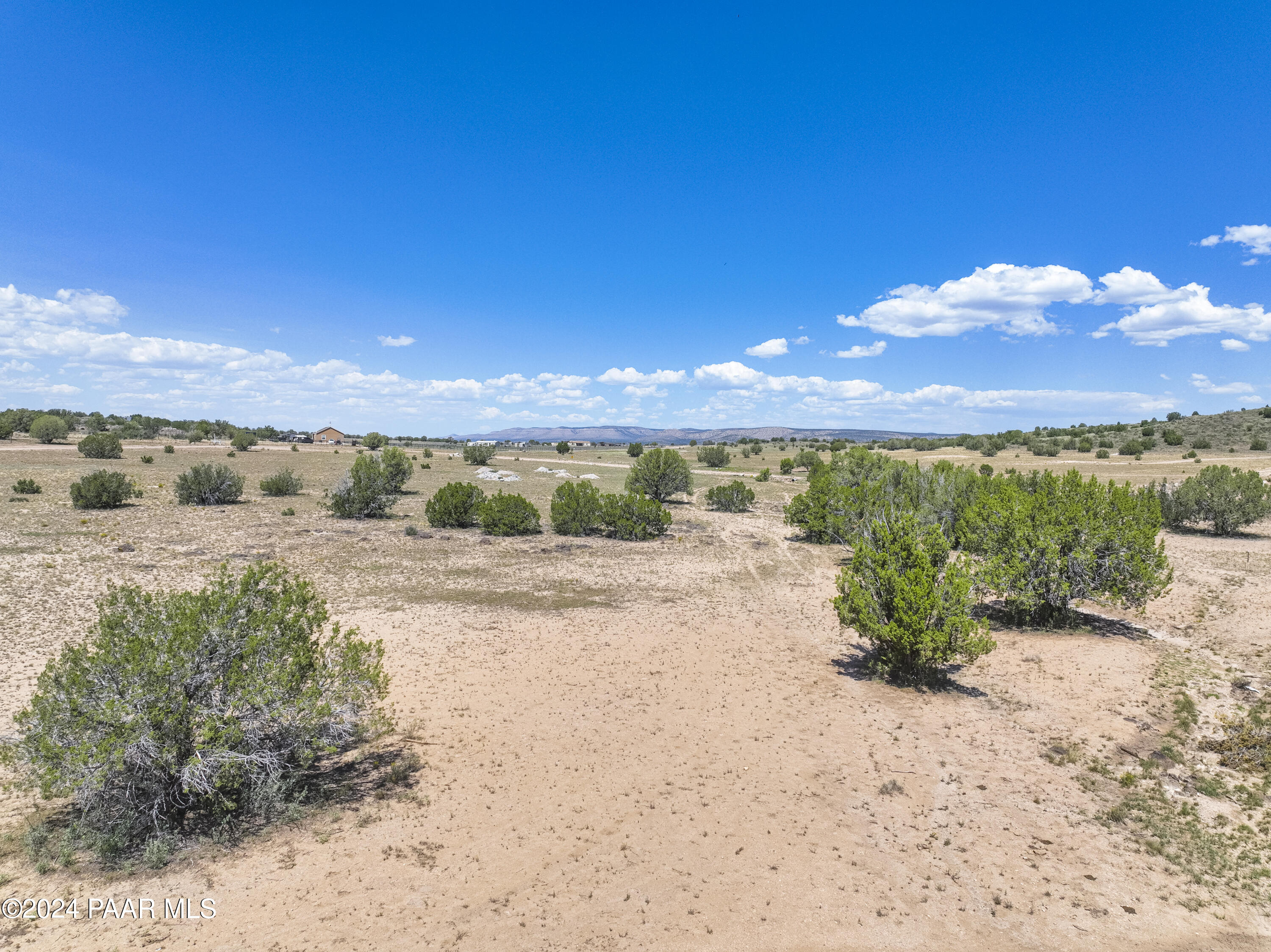 2 Acre Ranch Paulden, AZ 86334 - Photo 10 of 18 a view of a lake with a beach