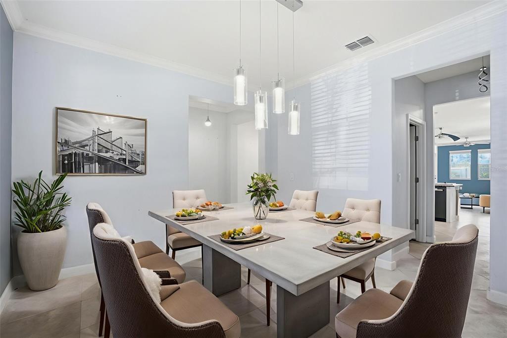 8676 Capstone Ranch Drive New Port Richey, FL 34655 - Photo 11 of 47 a view of a dining room with furniture and wooden floor