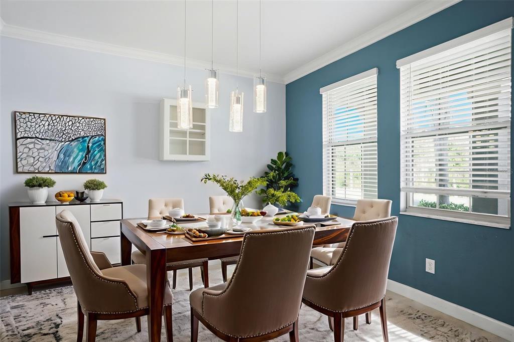 8676 Capstone Ranch Drive New Port Richey, FL 34655 - Photo 13 of 47 a view of a dining room with furniture window and outside view