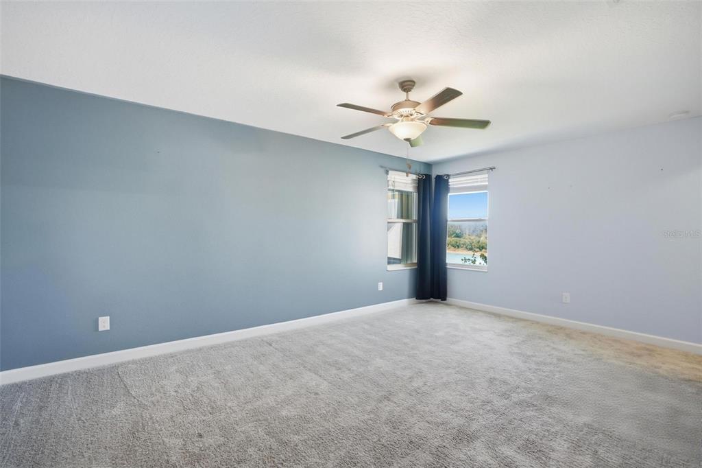 8676 Capstone Ranch Drive New Port Richey, FL 34655 - Photo 25 of 47 a view of an empty room with a window