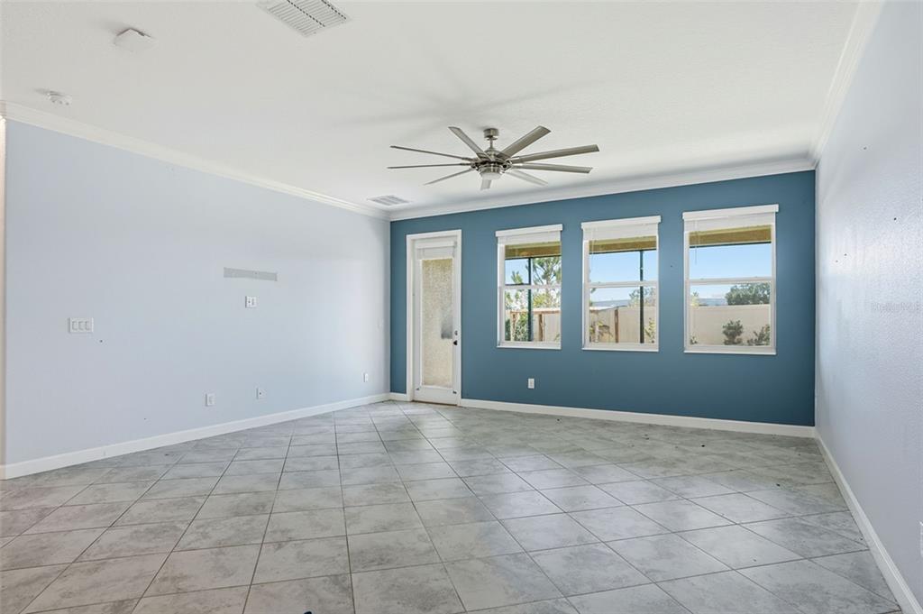 8676 Capstone Ranch Drive New Port Richey, FL 34655 - Photo 4 of 47 a view of an empty room with a window