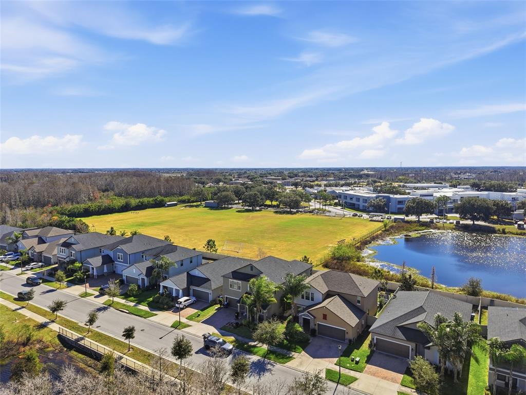 8676 Capstone Ranch Drive New Port Richey, FL 34655 - Photo 46 of 47 an aerial view of tennis court