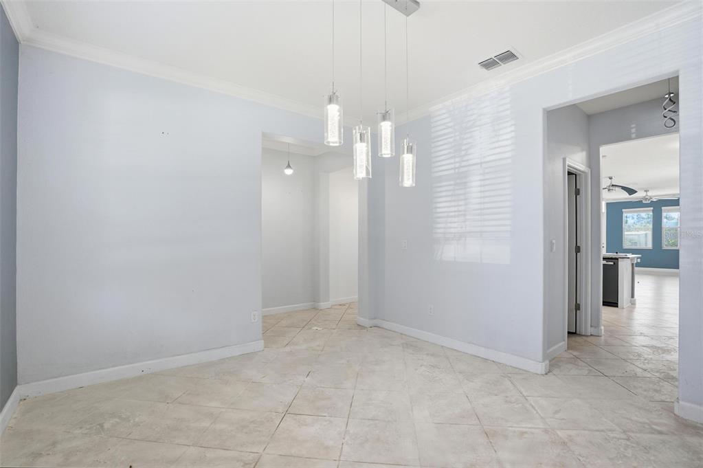 8676 Capstone Ranch Drive New Port Richey, FL 34655 - Photo 10 of 47 wooden floor in a room with a mirror