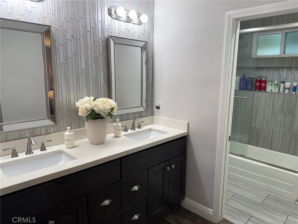 1530 Robin Way Fullerton, CA 92835 - Photo 11 of 35 a bathroom with a sink double vanity and a mirror