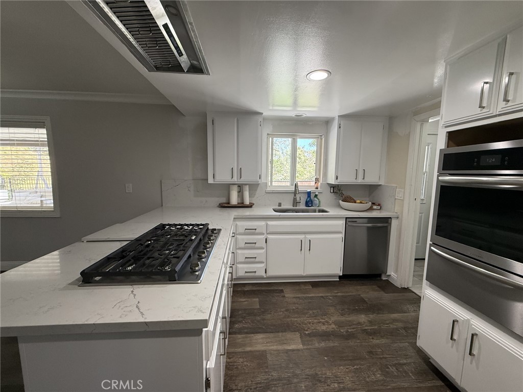 1530 Robin Way Fullerton, CA 92835 - Photo 17 of 35 a kitchen with a stove oven and sink