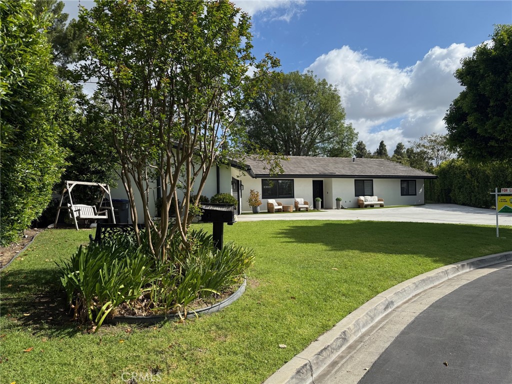 1530 Robin Way Fullerton, CA 92835 - Photo 35 of 35 a front view of a house with a yard