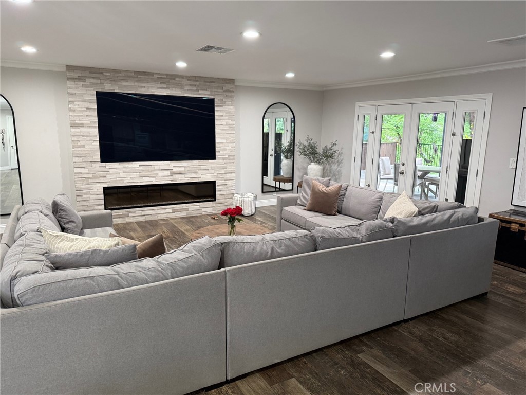 1530 Robin Way Fullerton, CA 92835 - Photo 5 of 35 a living room with furniture and a flat screen tv