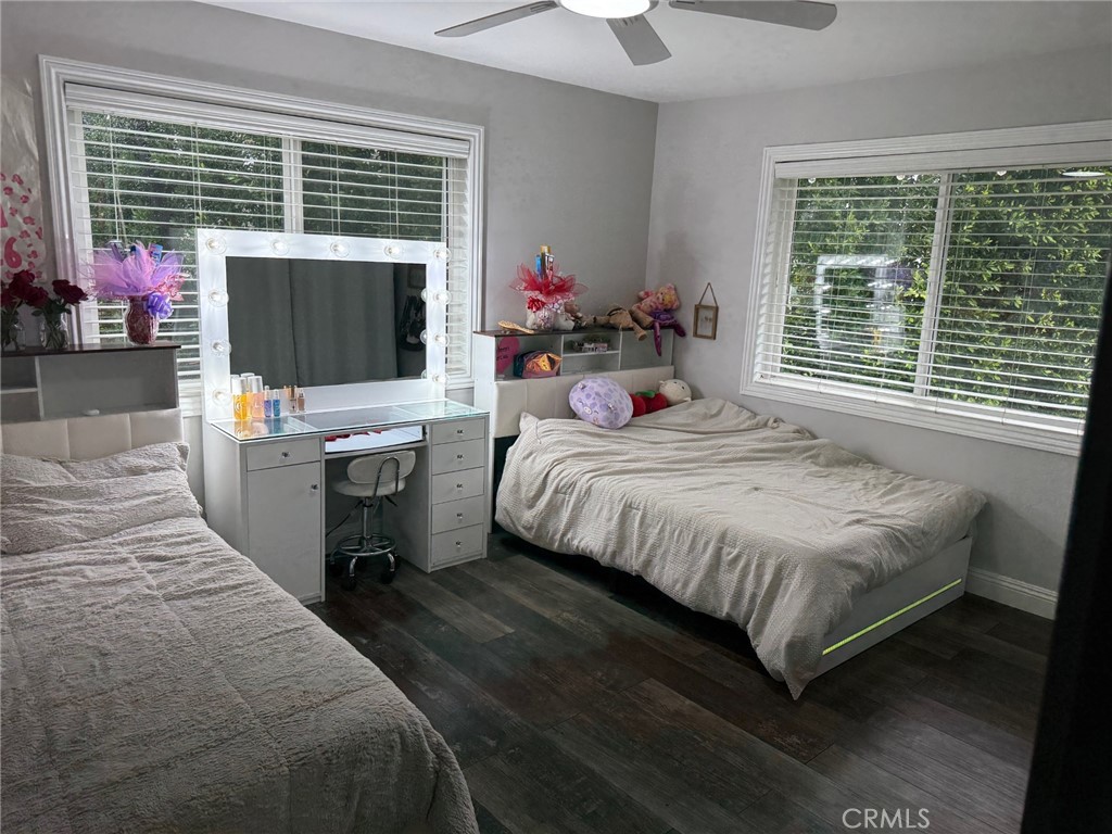 1530 Robin Way Fullerton, CA 92835 - Photo 7 of 35 a bedroom with a bed wooden floor and window