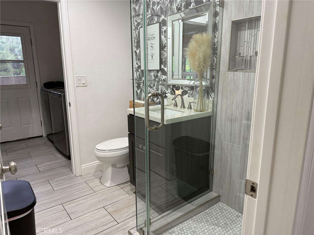 1530 Robin Way Fullerton, CA 92835 - Photo 9 of 35 a bathroom with a sink a toilet and shower