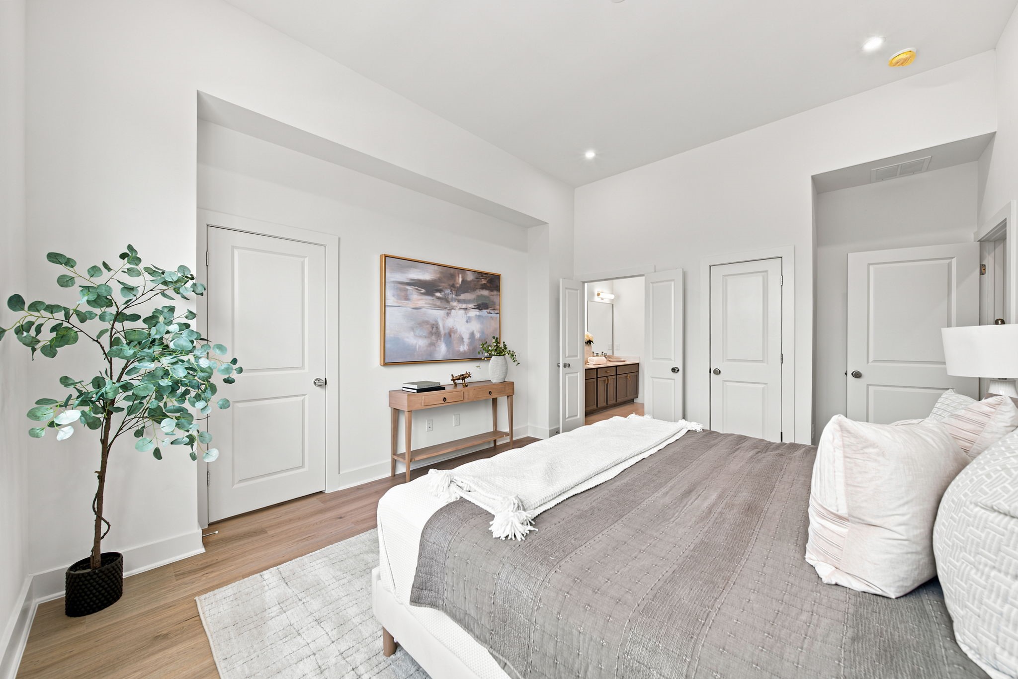 1650 West Tidwell Road Houston, TX 77091 - Photo 20 of 35 Generous proportions and a thoughtful layout make this bedroom both comfortable and functional. Warm flooring, recessed lighting, crisp white walls, and direct access to the adjoining bathroom create a private retreat, while multiple storage areas help support an organized lifestyle.