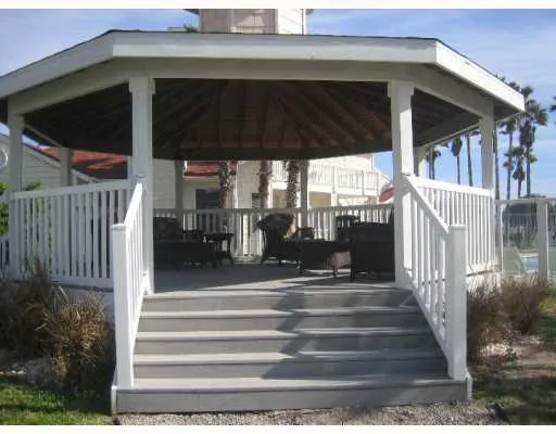 a view of fountain in front of house