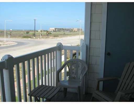 a view of a balcony with an outdoor space