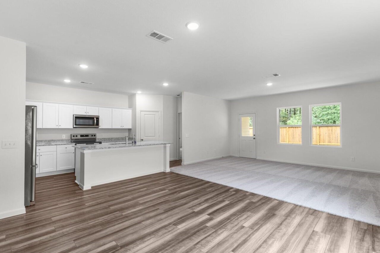 3107 Diamond Vw Lane Angleton, TX 77515 - Photo 5 of 14 a view of kitchen with sink wooden floor and window