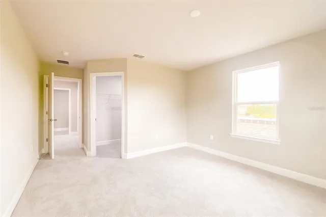 a view of staircase with rug floor