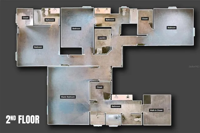 an aerial view of a kitchen with stainless steel appliances