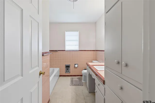 a view of a room with racks on the wall