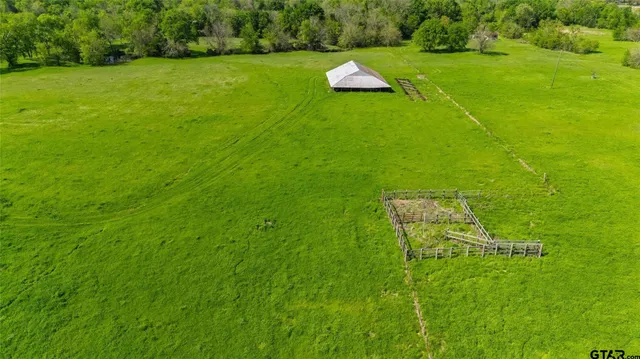 a view of a golf course with a lake