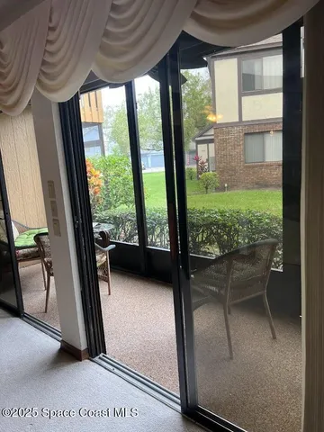 a view of a porch with furniture