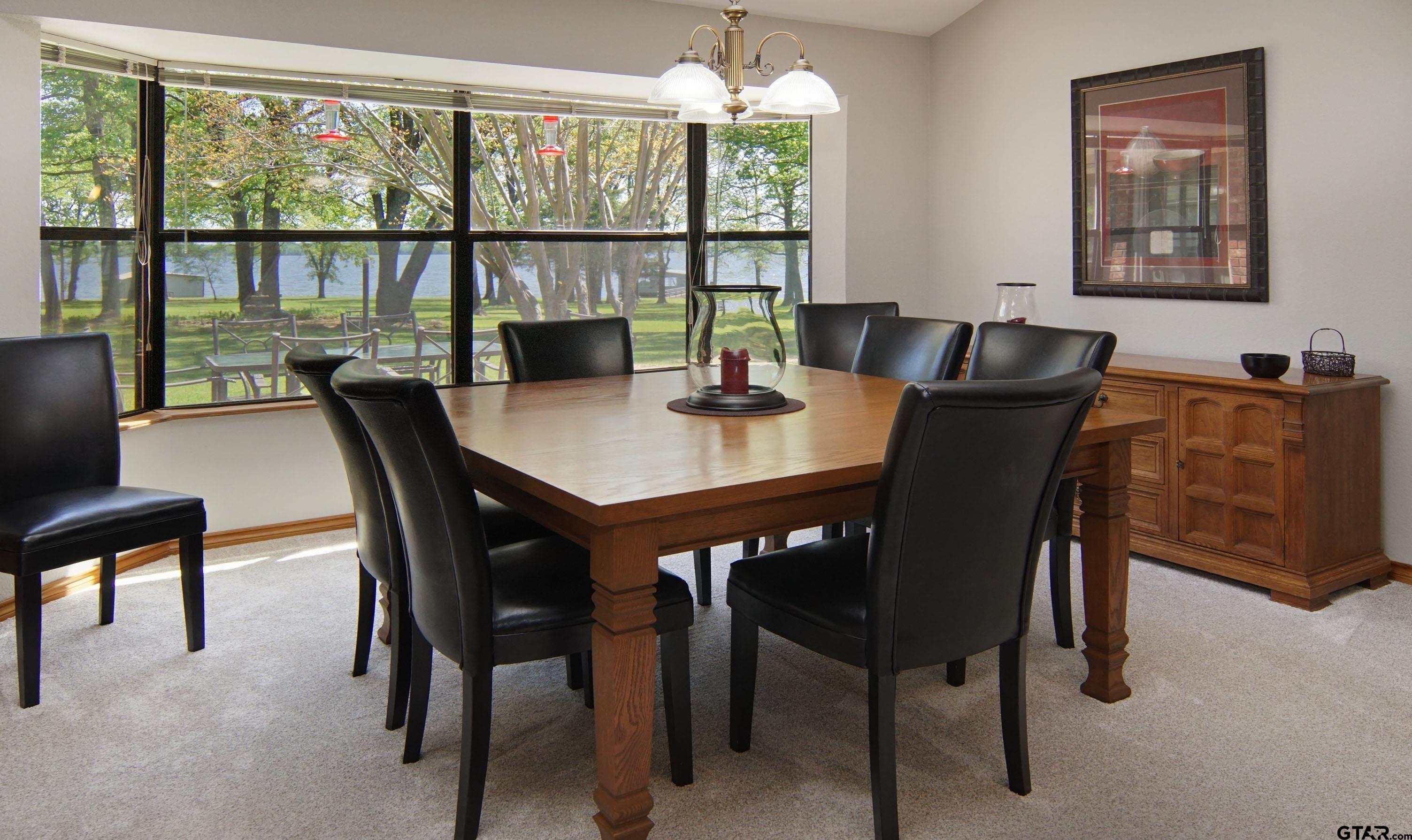 227 Private Road 5885 Yantis, TX 75497 - Photo 4 of 41 a view of a dining room with furniture window and outside view