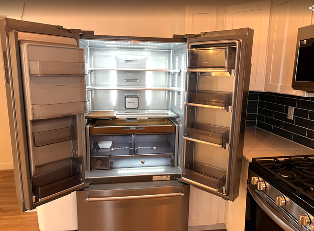 545 23rd Street Ogden, UT 84401 - Photo 4 of 28 Stainless steel French door refrigerator with integrated interior lighting, multiple crisper drawers, and ample shelving
