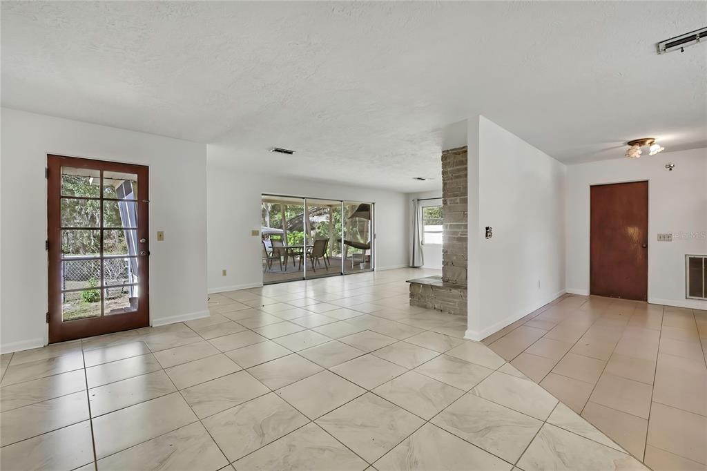 12130 Maple Street Dunnellon, FL 34432 - Photo 17 of 54 a view of an empty room and window
