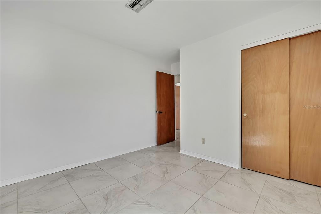 12130 Maple Street Dunnellon, FL 34432 - Photo 39 of 54 a view of an empty room