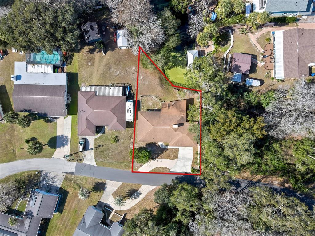 12130 Maple Street Dunnellon, FL 34432 - Photo 51 of 54 an aerial view of residential houses with outdoor space