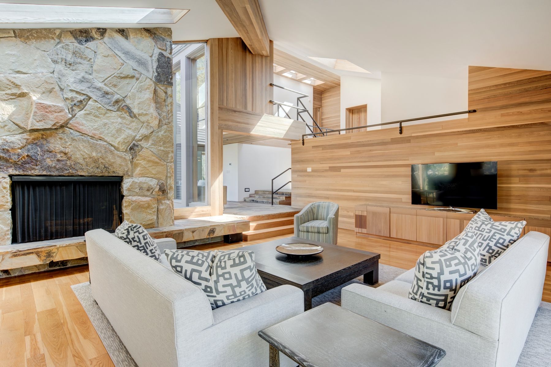 77 Cross Highway East Hampton, NY 11937 - Photo 3 of 17 a living room with fireplace furniture and a fireplace