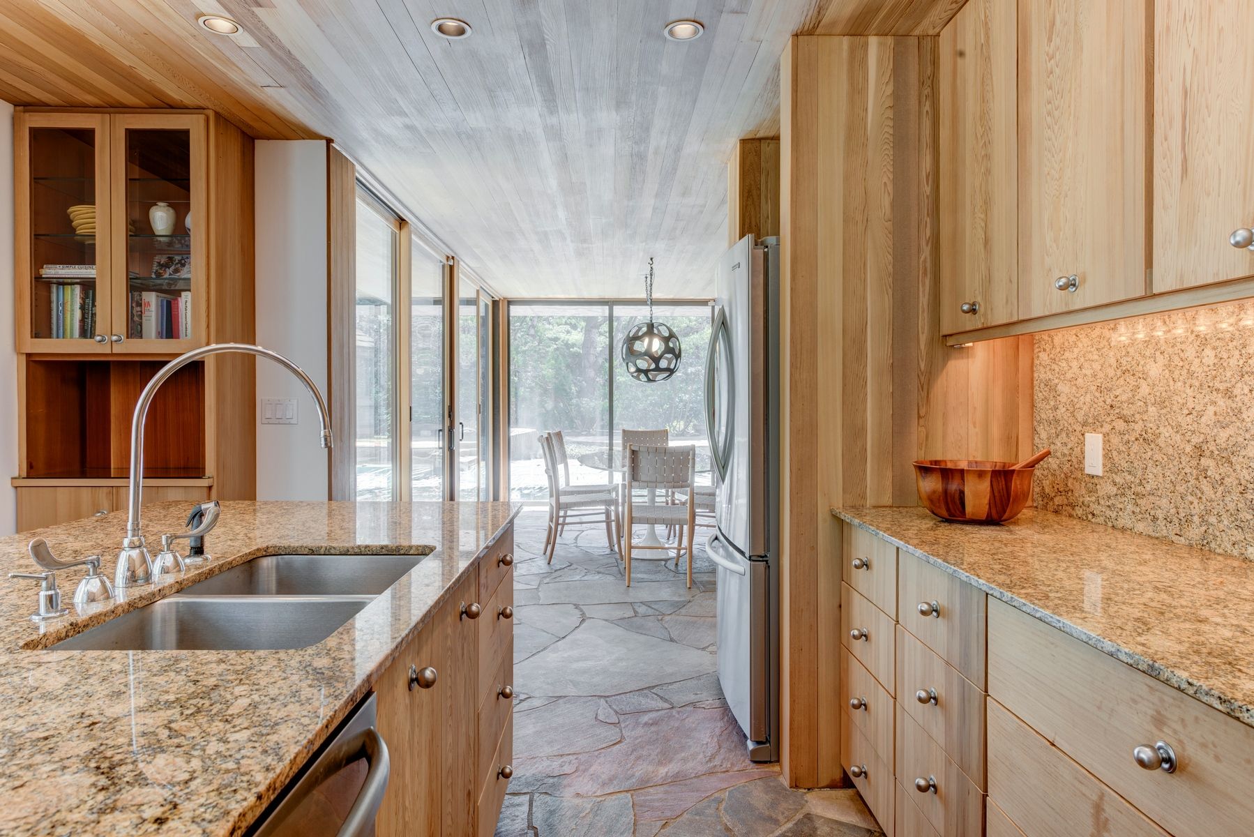 77 Cross Highway East Hampton, NY 11937 - Photo 6 of 17 a kitchen with stainless steel appliances granite countertop a sink and a refrigerator